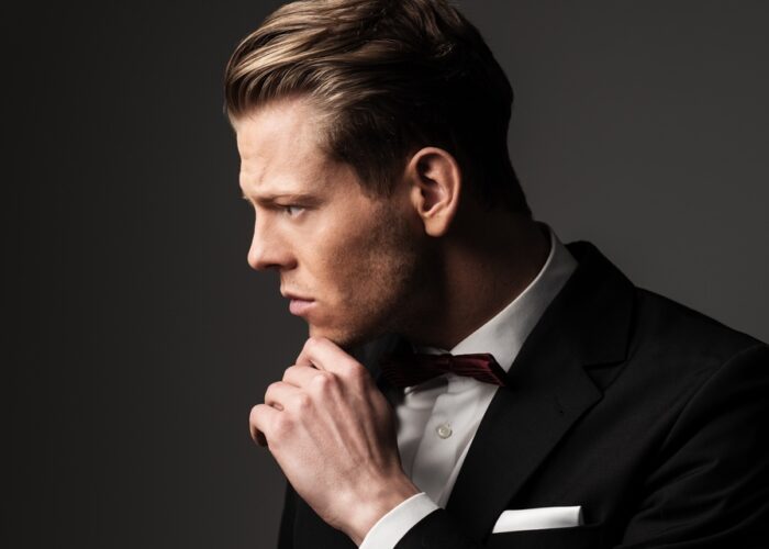 Sharp dressed fashionist wearing jacket and bow tie